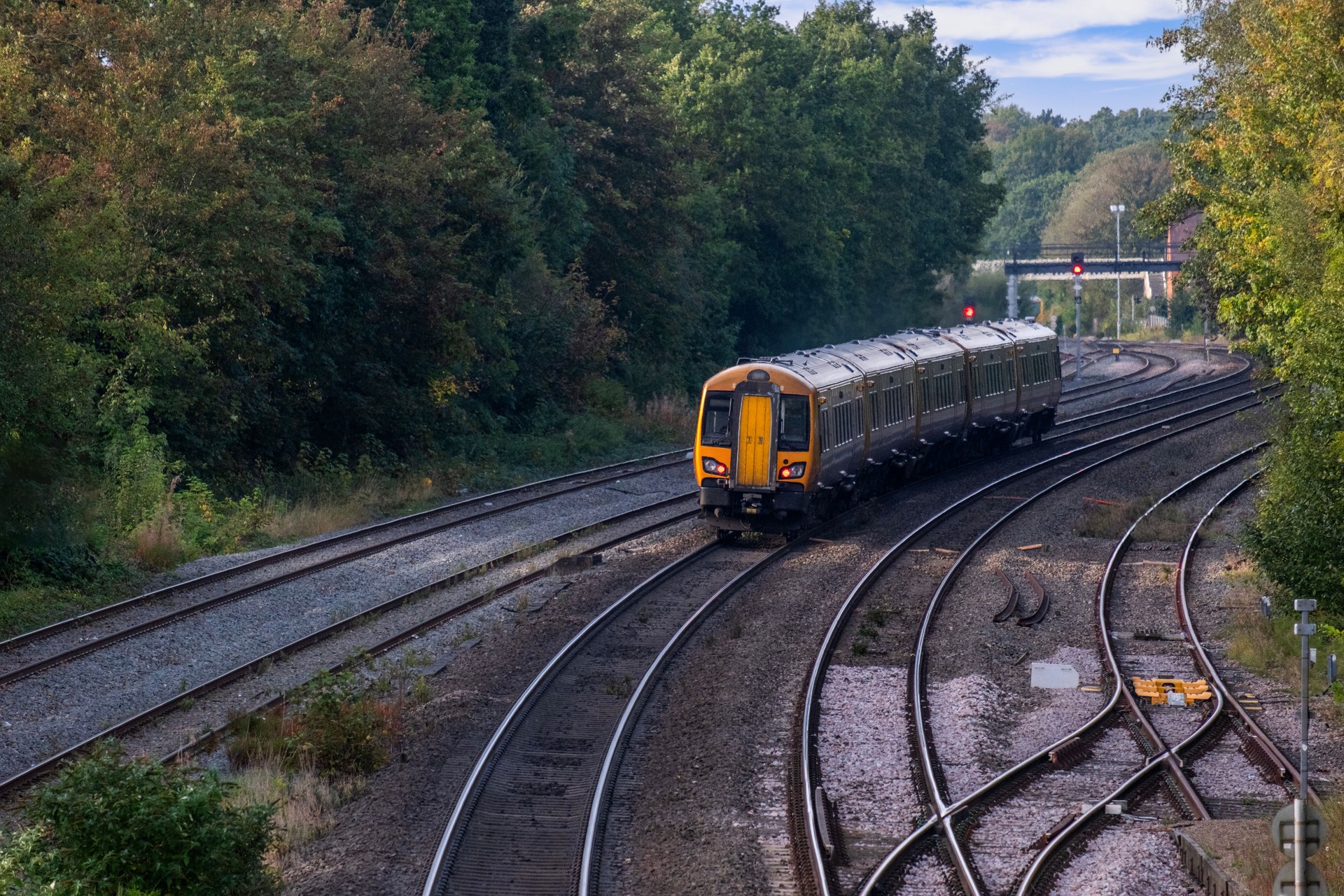 Generic Diesel powered railway line station in the English countryside.