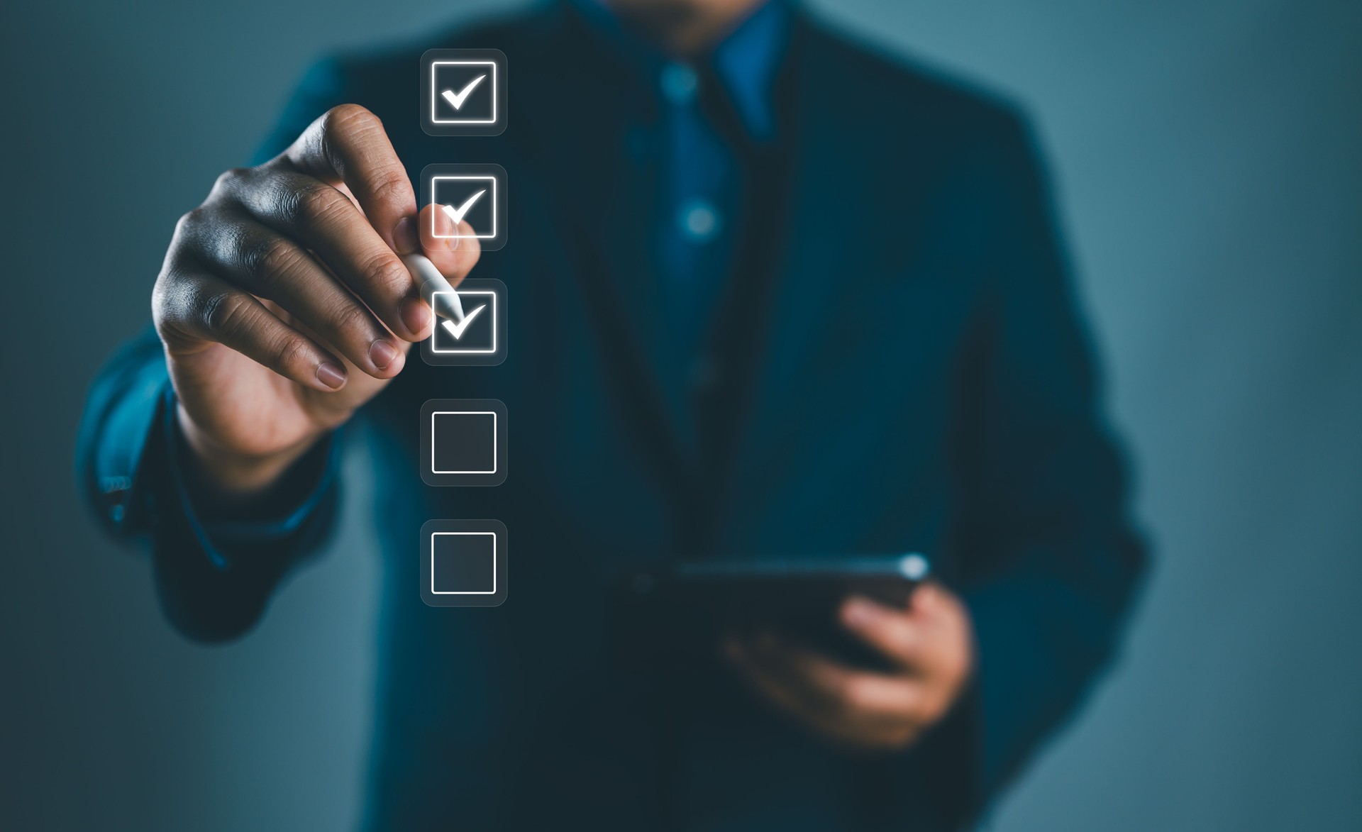 the person holding a tablet ticks the checkmark in the box. on the list of documents. the concept of check form online, checklist process order. business verify task detail and evaluation tick mark