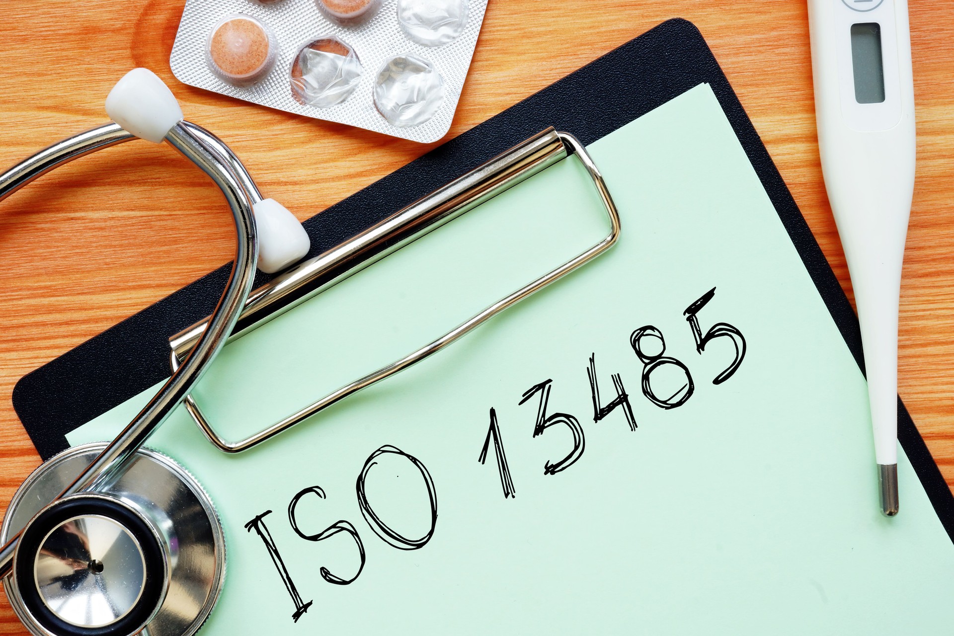 iso 13485 is shown on the business photo using the text